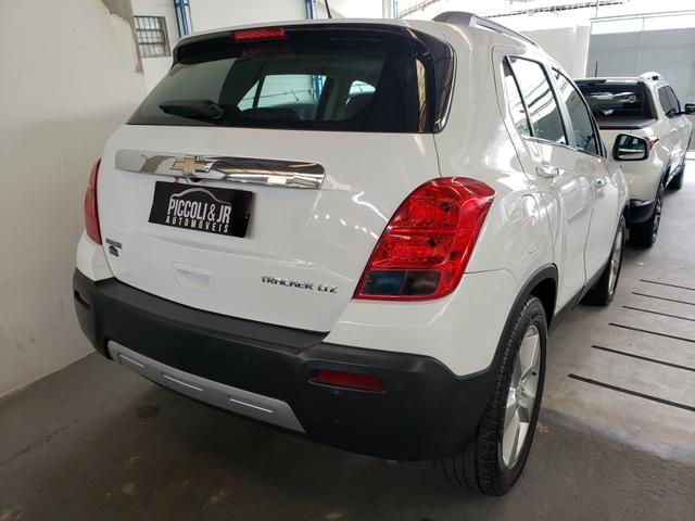 Chevrolet Tracker 1.8 Automatico com teto solar vendo troco e financio R$ - Foto 5