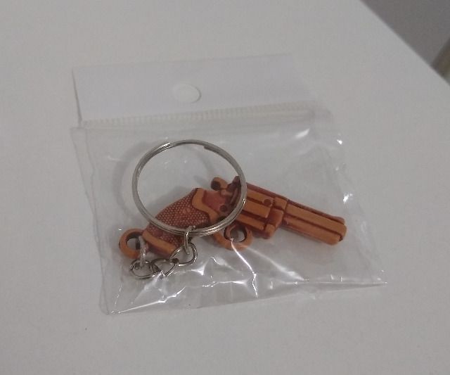Chaveiro em formato de Revólver