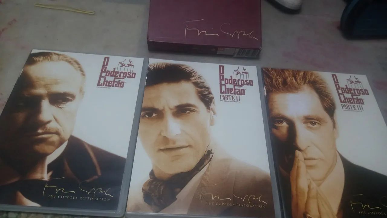 DVD original trilogia o poderoso chefão em perfeito estado - Foto 3