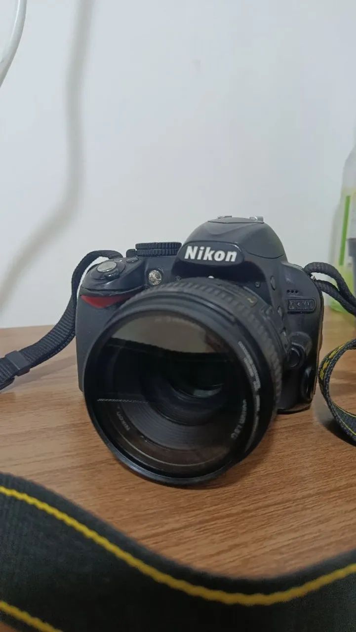 Nikon D3100+Lente 50mm Nikon+bag P/Trasporte  e flash yougnuo 