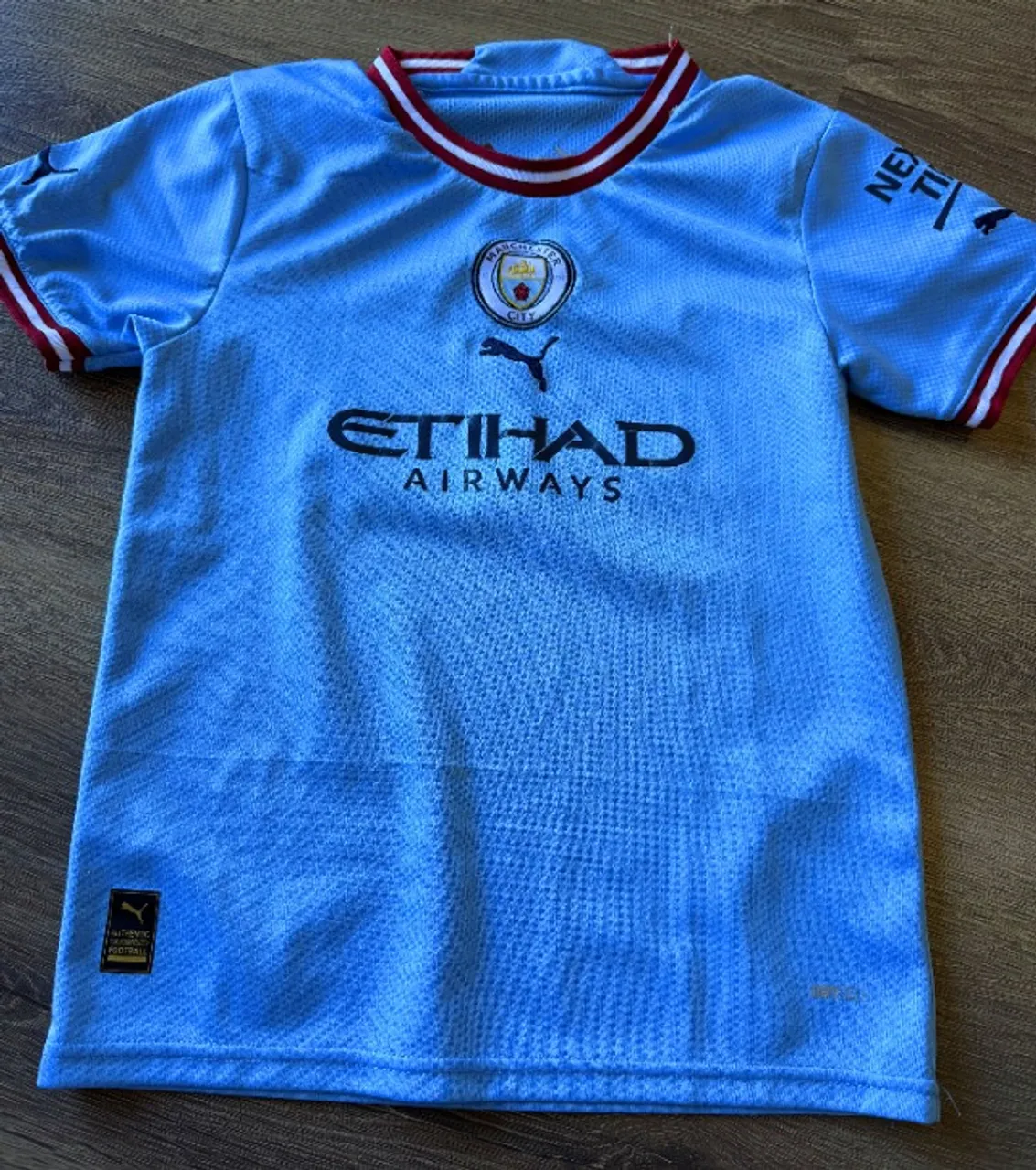 Camiseta oficial do Manchester City infantil