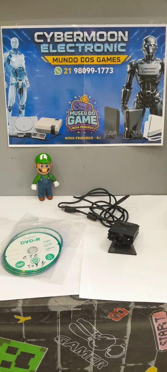 Câmera Playstation 2 com jogos 