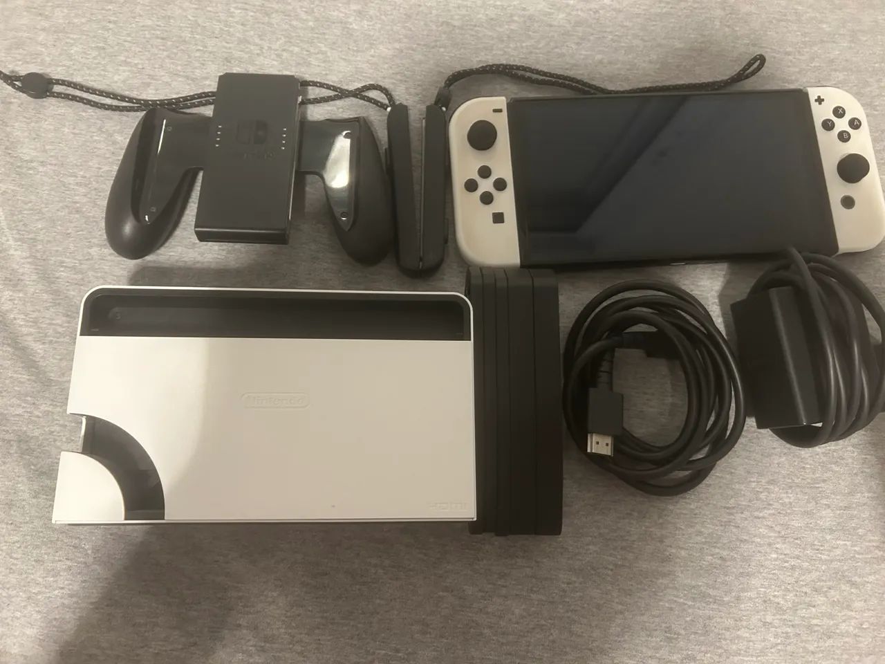 Nintendo Swich OLED 64g com todos acessórios, case e jogo - Foto 2
