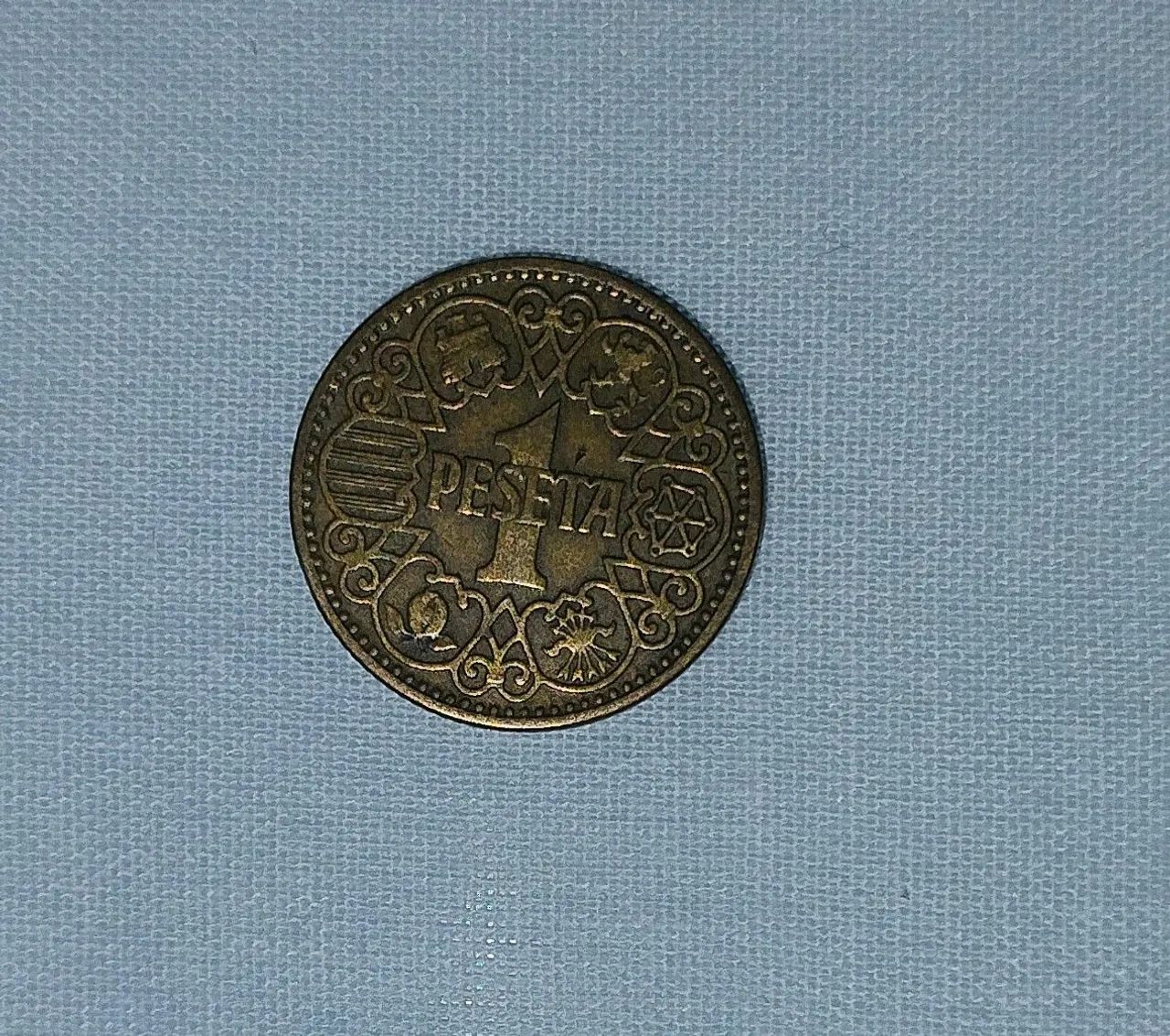 Moeda de 1 PESETA espanhola.