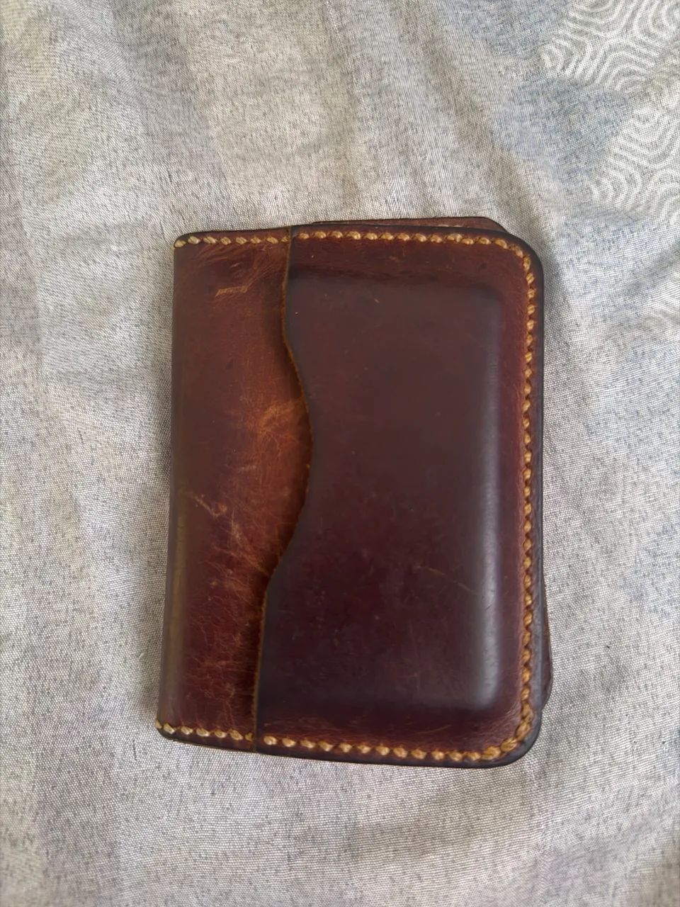 Carteira de couro legítimo.
