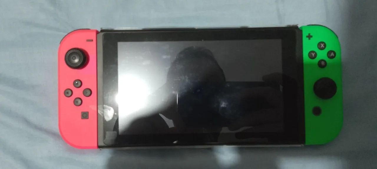Console Nintendo Switch (v1) - Bloqueado, com jogo - Foto 3