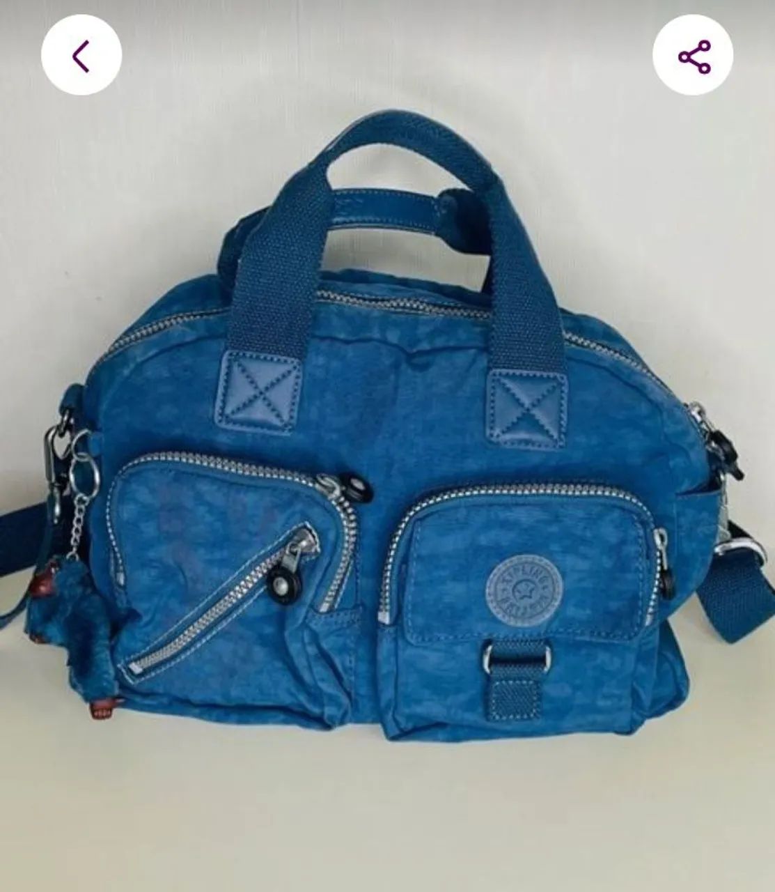 Bolsa kipling azul original comprada no Japão com nf acompanha um chaveiro  - Foto 3
