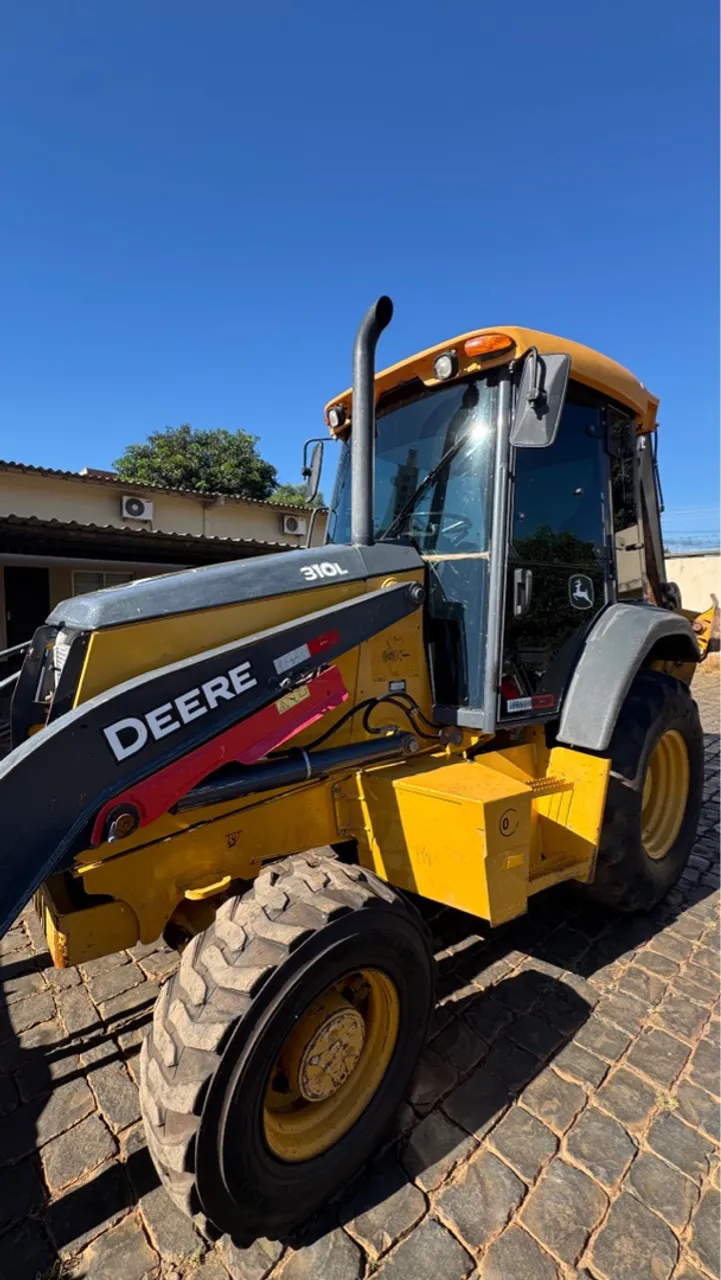 Retro escavadeira John deere 310 L