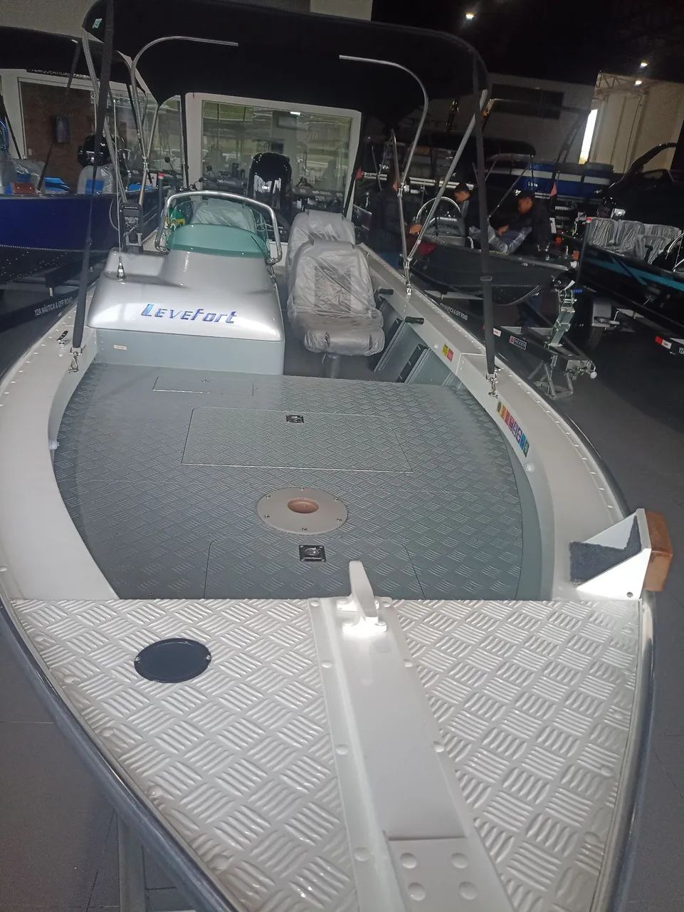 Lancha marfim 6.0 + motor 60hp Mercury  - Foto 9