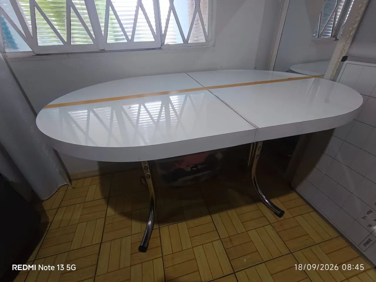 Mesa oval com extensão 