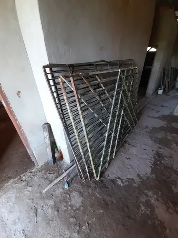 Portão de ferro roliço