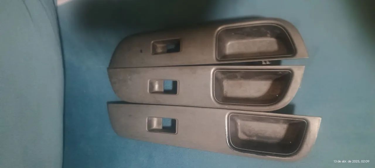 3 acabamento de portas interno Nissan Tiida 