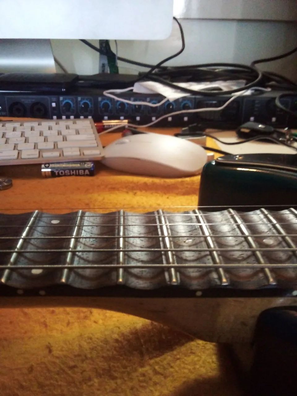 Guitarra  escalopada 