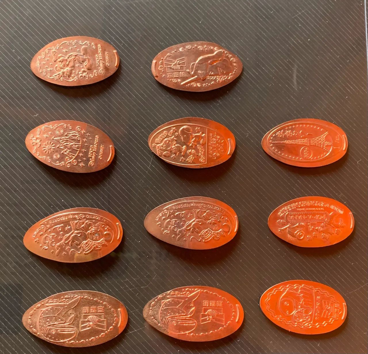 Lote de 11 moedas da Disney Tokyo - Foto 4