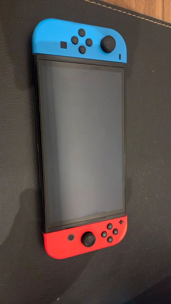 Nintendo Switch OLED + SD 256gb + acessorios