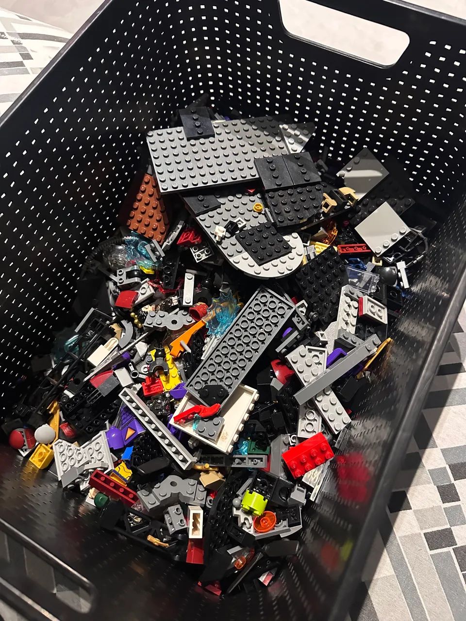 Box full of original LEGO pieces and a few genuine ones