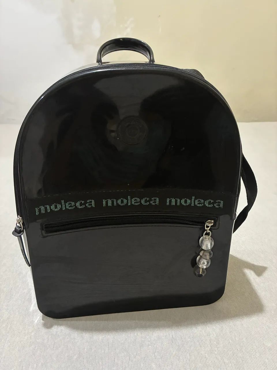 Mochila da moleca. Chama no zap *69