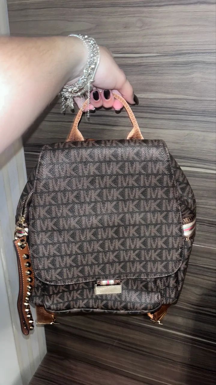 Mochilinha estampada NK Nunca usada  - Foto 5
