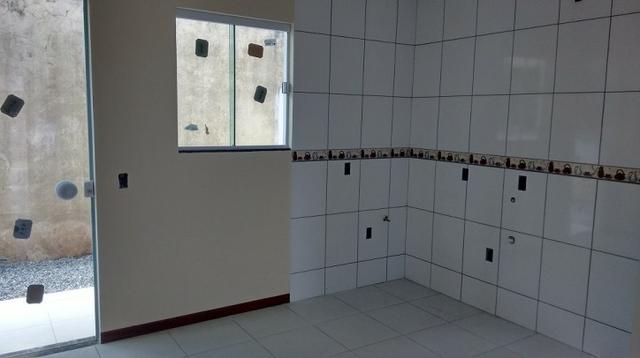 1179 Sobrado Geminado Averbado no Centro, excelente localização - Foto 4