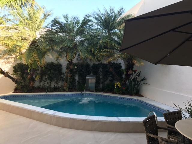 Maravilhosa casa com 5 suites e piscina no Itaigara ! totalmente mobiliada - Foto 5
