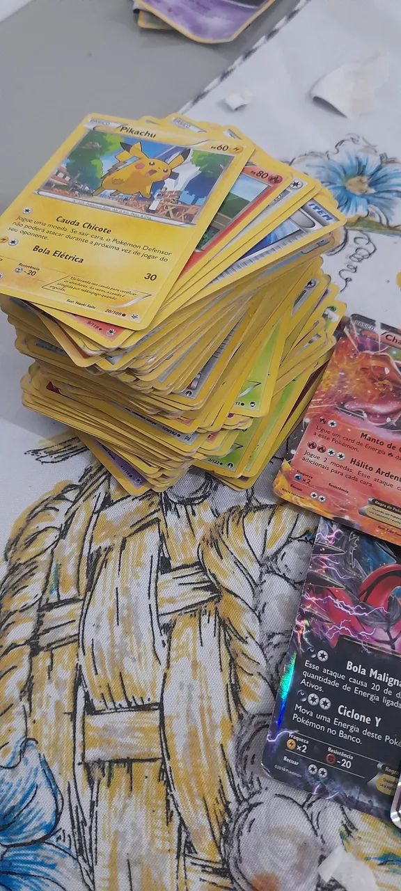 Cartas pokemon + caixa e moeda - Foto 2