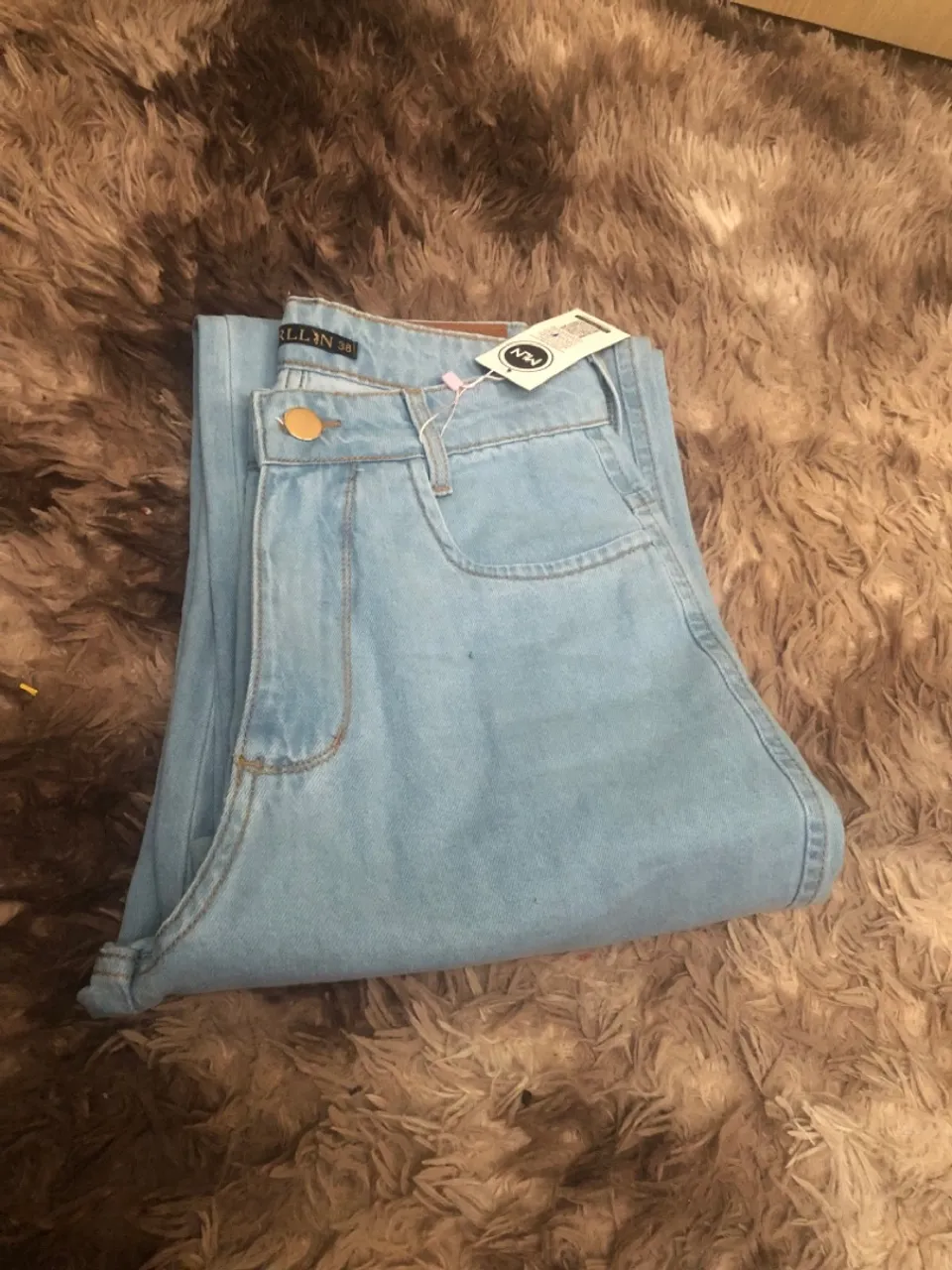 Calça jeans clara wide leg pantalona