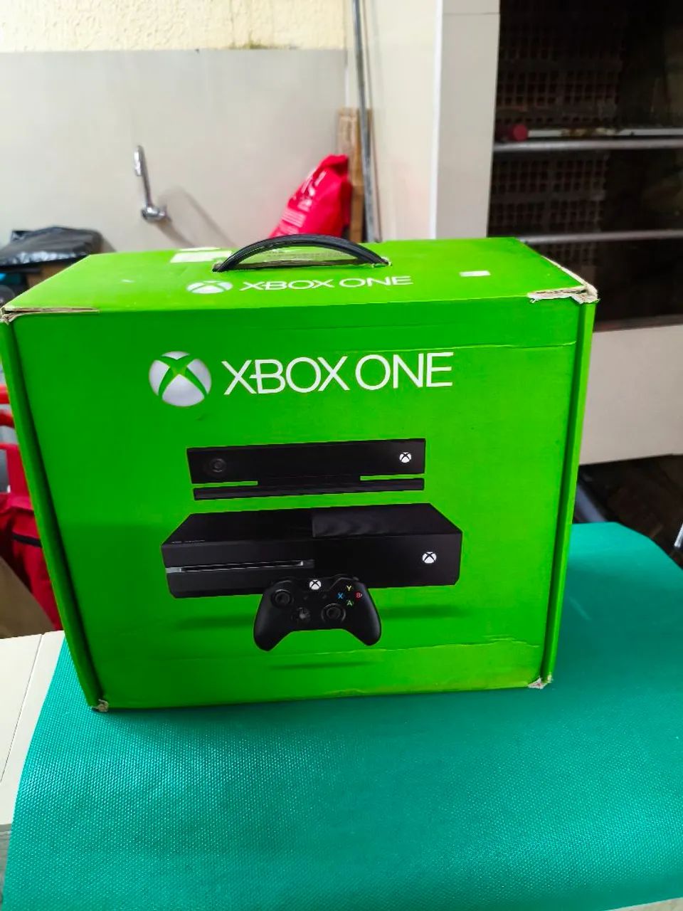 Caixa Xbox One com berço, vazia 
