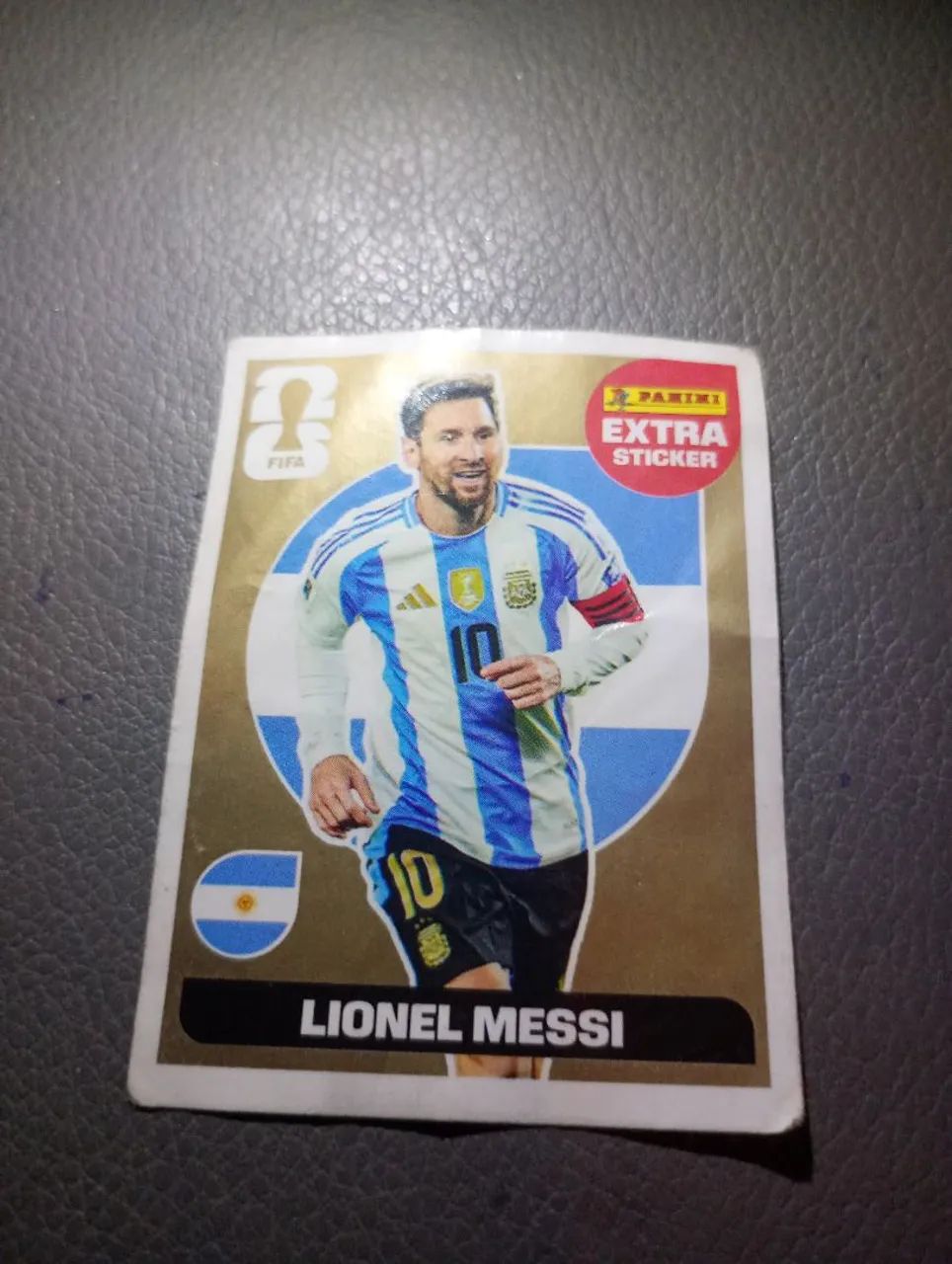Figurinha rara de ouro (Messi)