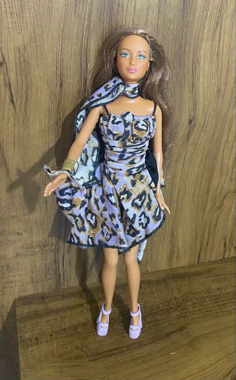 Barbie morena com roupa de onça  - Foto 3