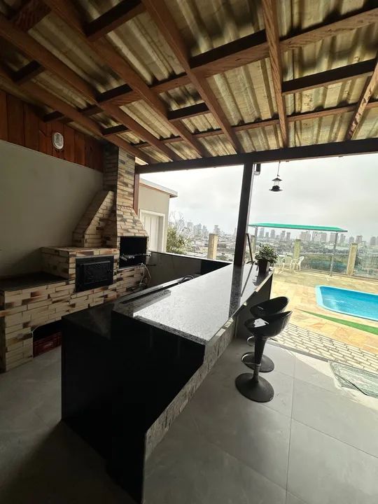 Linda casa com piscina , 04 suítes , 06 vagas garagens . - Foto 9