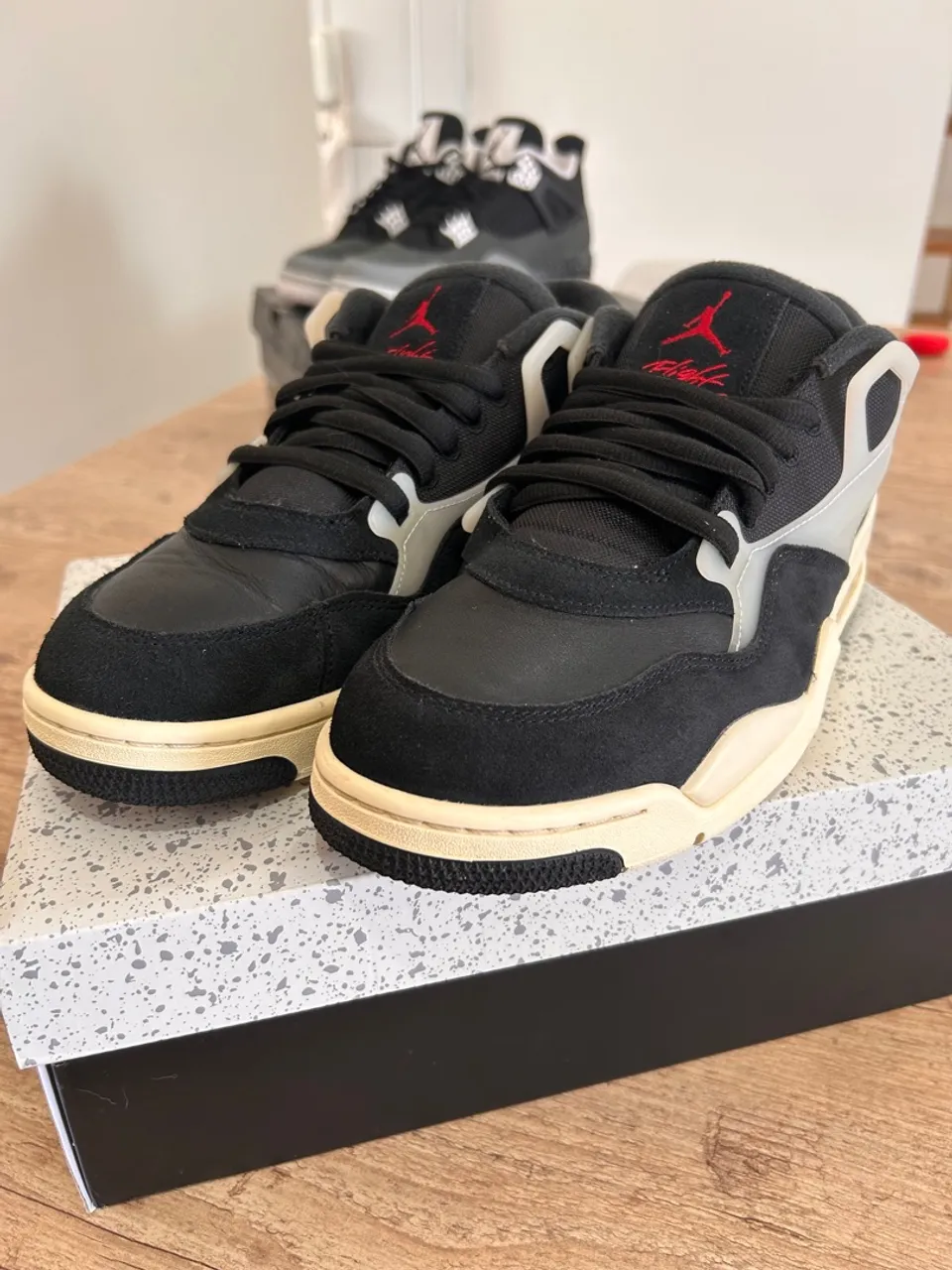 Air Jordan 4 RM Black Sail