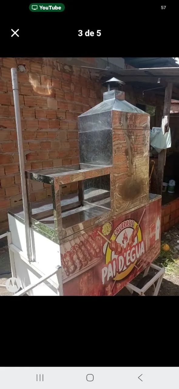 Carrinho pra vender churrasco.