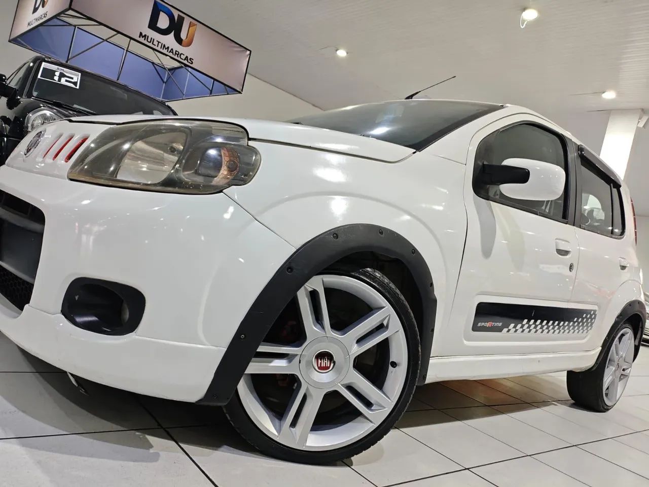 Fiat Uno Sporting 1.4 EVO Fire Flex 8V 4P 2013 - Foto 3