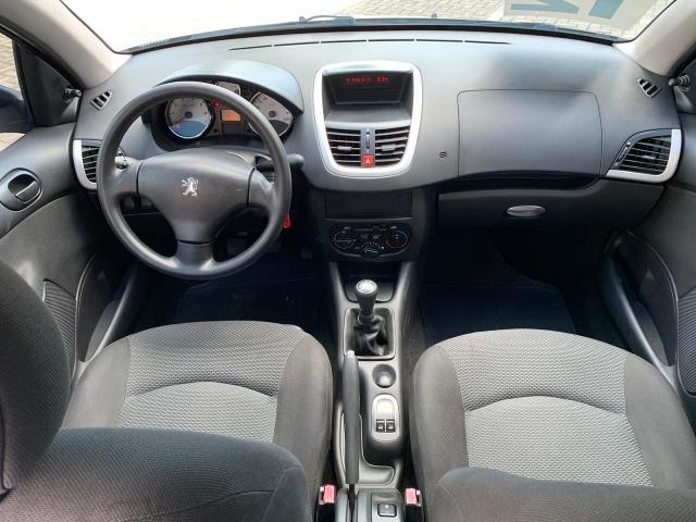 Peugeot 207 Passion XR 2011/2012 1.4 8V Flex 4P Manual - 2012 - Foto 9