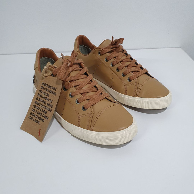 tenis forma grande