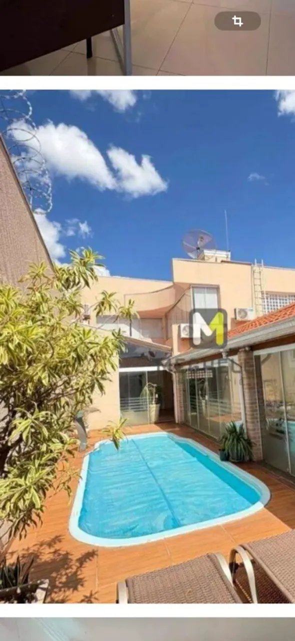 Piscina aquecida, com hidromassagem e cascata.