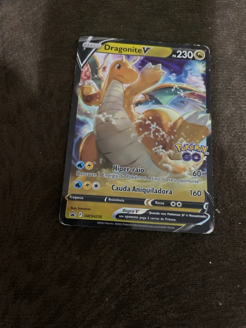 Carta Pokémon Dragonite V - Pokémon GO OBS: com amassados