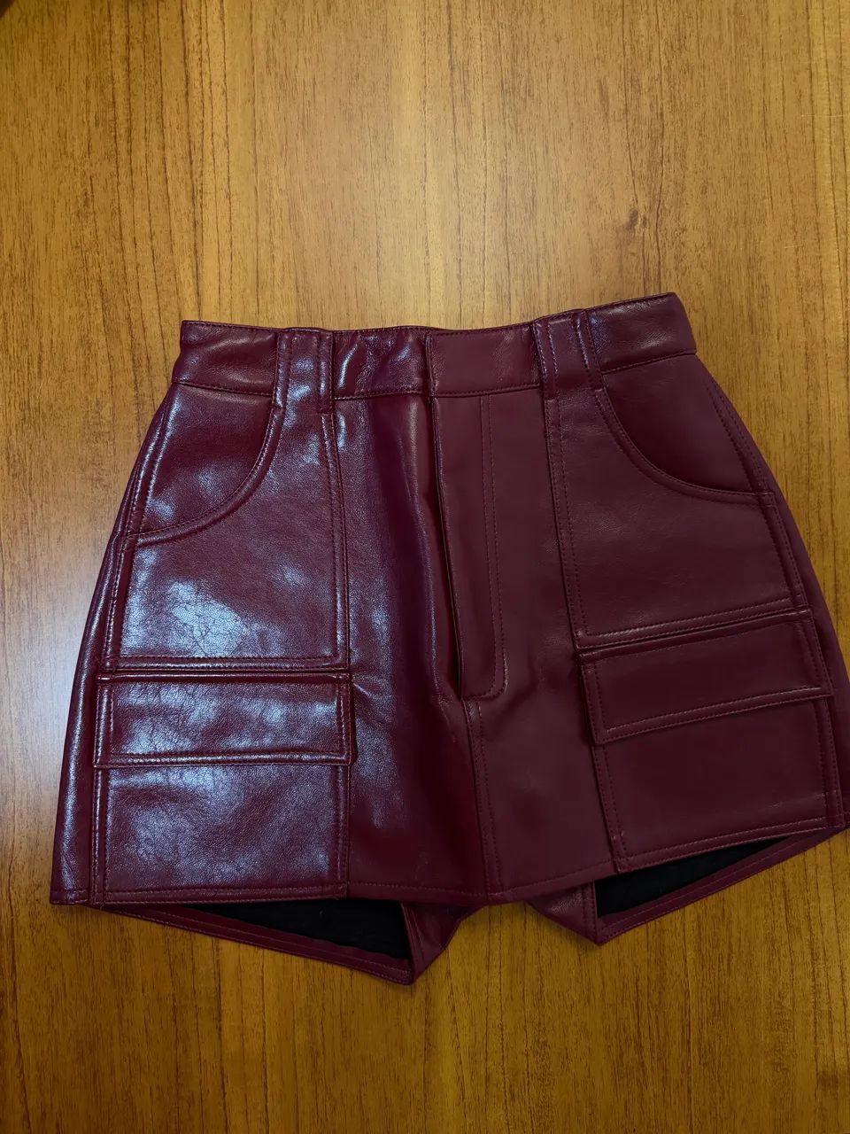 Short saia couro nova renner 
