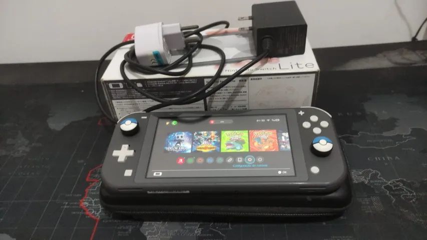 Nintendo Switch Lite Cinza Com Caixa + Case de Transporte - Foto 4