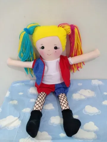 Boneca da arlequina infantil