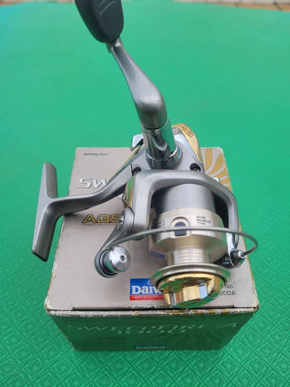 Molinete daiwa swep Firefox  A 1000 - Foto 4