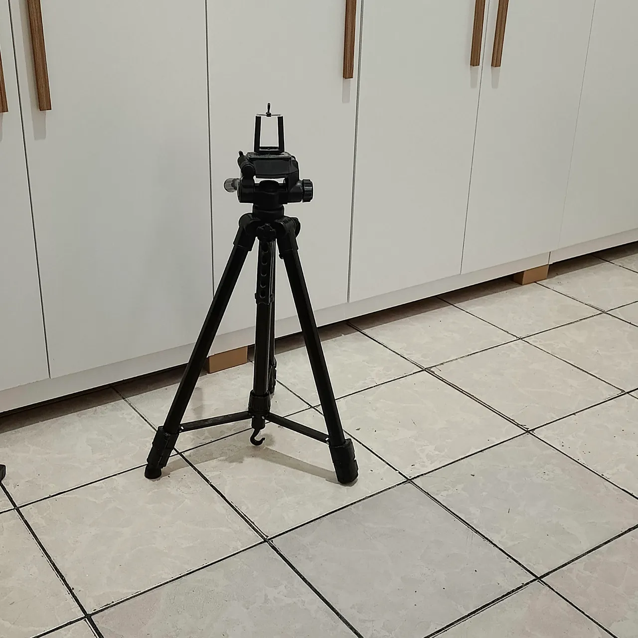 Tripé para câmera e filmadoras