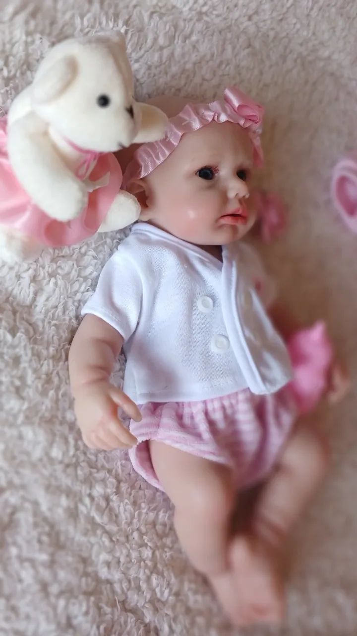 Boneca Reborn Toda  de Silicone Sólido 35 cm. - Foto 3