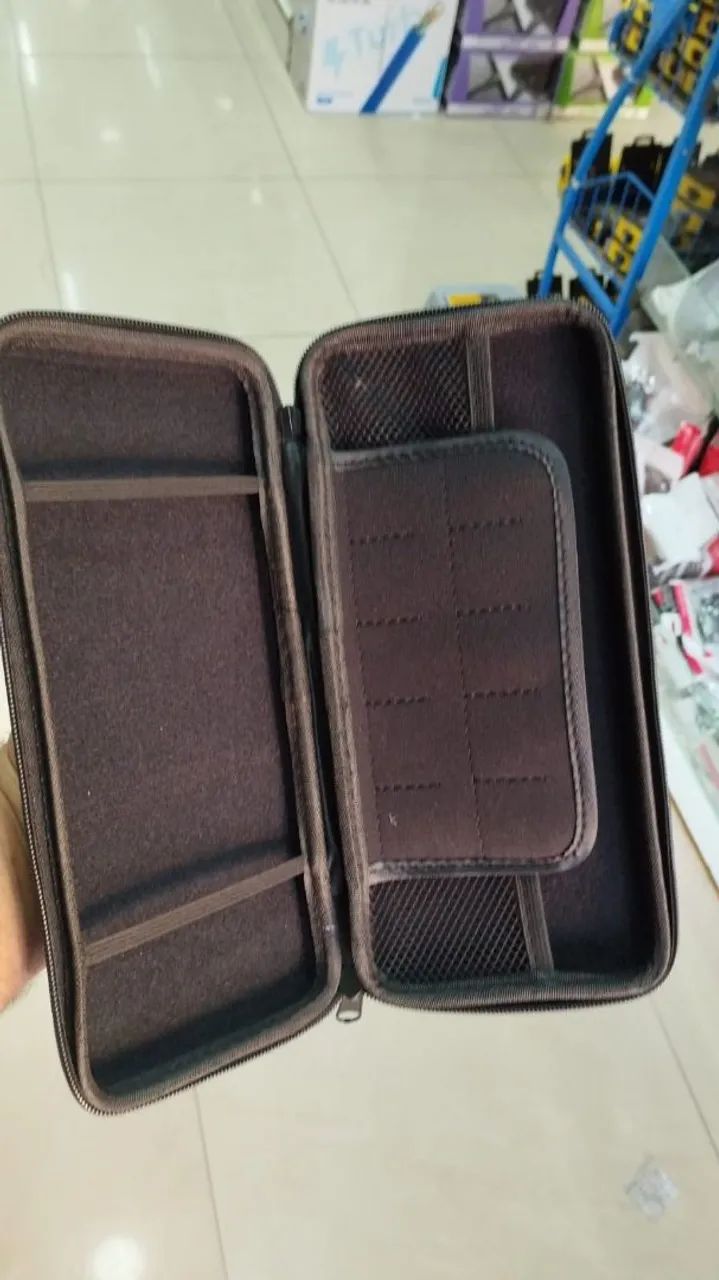 Case transporte switch oled v1 V2 com compartimento cartuchos - Foto 3
