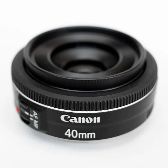 Lente Canon EF 40mm f/2.8 STM Pancake Macro, estado de nova + parasol metal original Canon - Foto 5