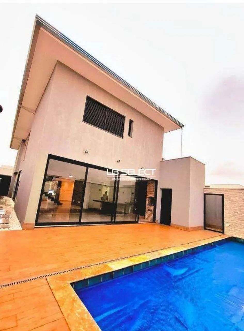 Casa no Condomínio Varandas Sul com cinco quartos e varanda gourmet.