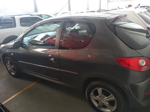 Peugeot 207* flex 1.4 completo* preço promocional - Foto 4