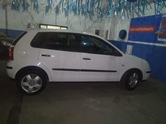 Polo Hatch 1.6 ano 2005 branco 4 portas completo emplacado 2019 troco - Foto 7