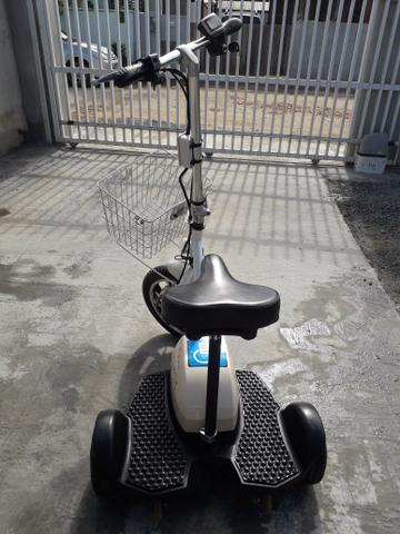 Triciclo elétrico com carregador - Foto 2