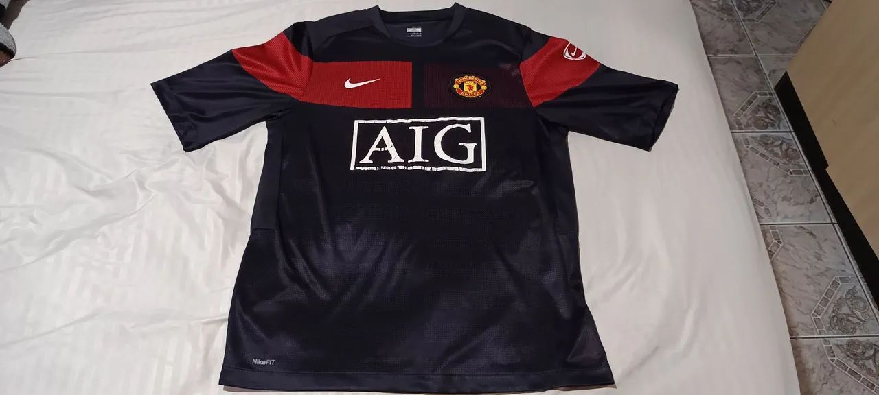Camisa de Futebol Manchester United AIG - Nike